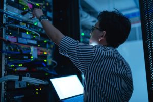 Computer,Engineer,Is,Setting,Up,Network,In,Server,Room,systems,Maintenance