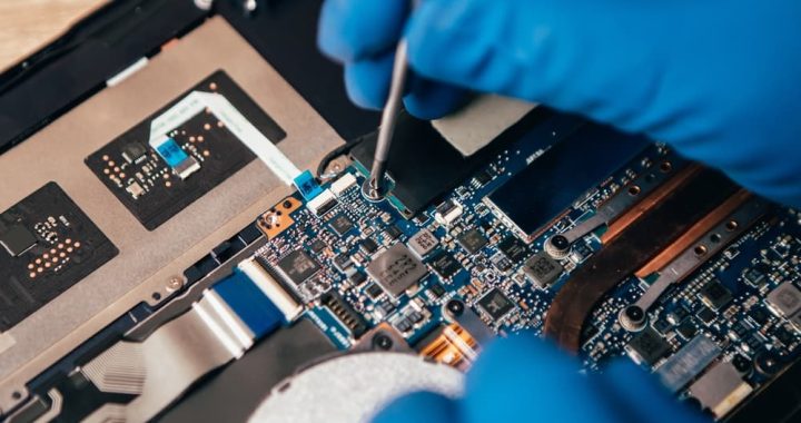 close-up-of-man-repairing-inside-of-computer